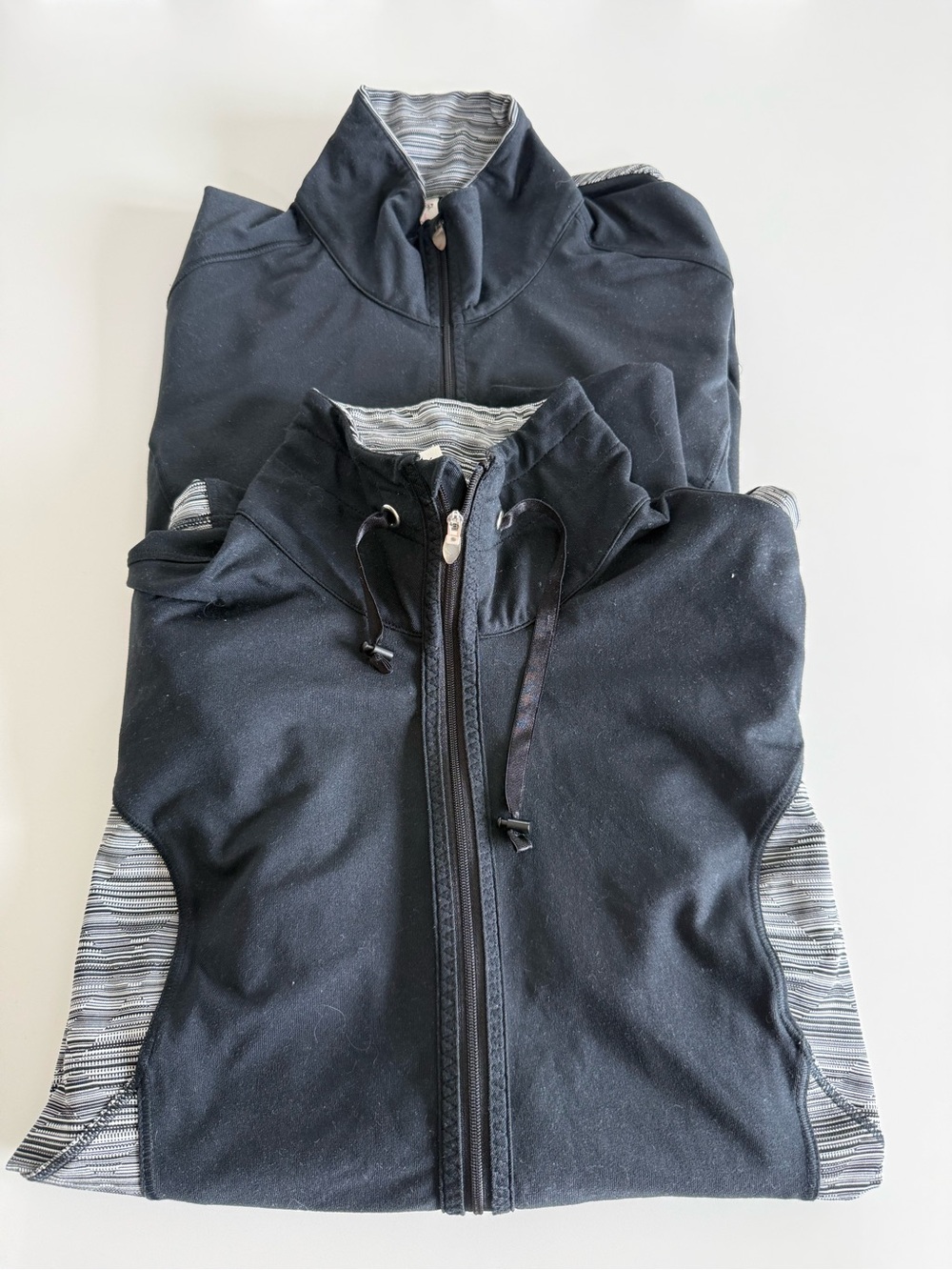 Woman’s 2 Moving Comfort Black Zip-Up Performance Jacket and 1/2 zip Large EUC!